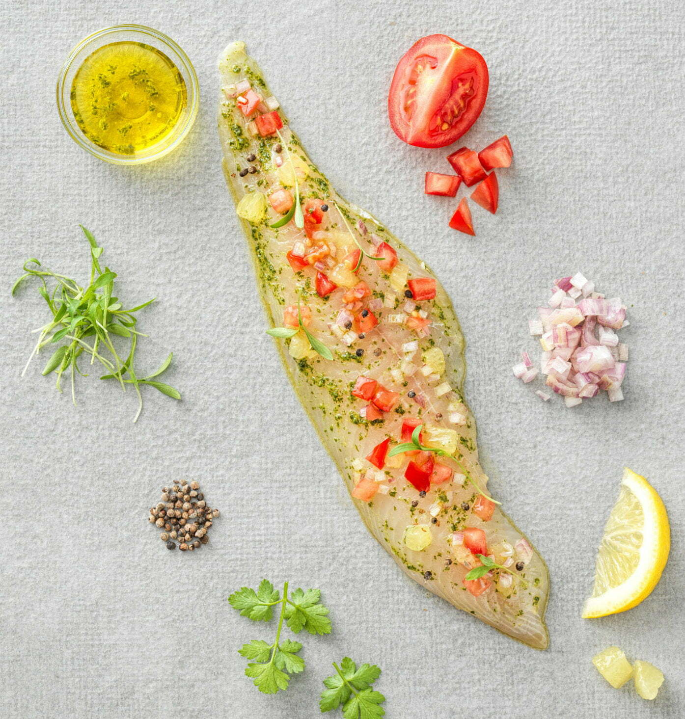 marinade-poisson-filet-huile-citron-tomate-sel-poivre-épices-CAP-Solutions-culinaires